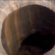 Illustration for article titled A Dramatic 260 Foot Crater Has Mysteriously Appeared In Siberia